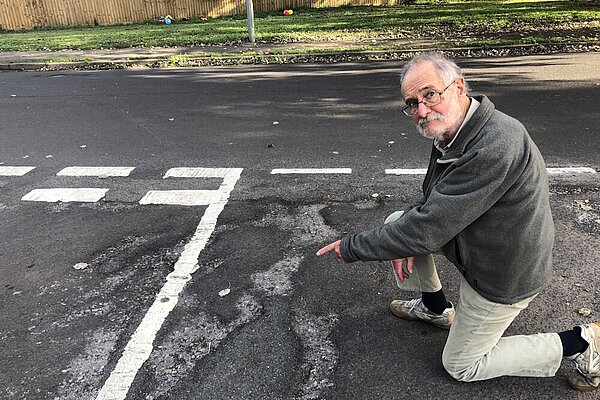 Pot Holes Three Legged Cross